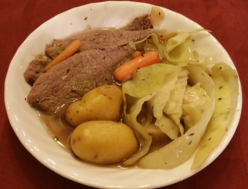 Plate of natural corned beef and cabbage
